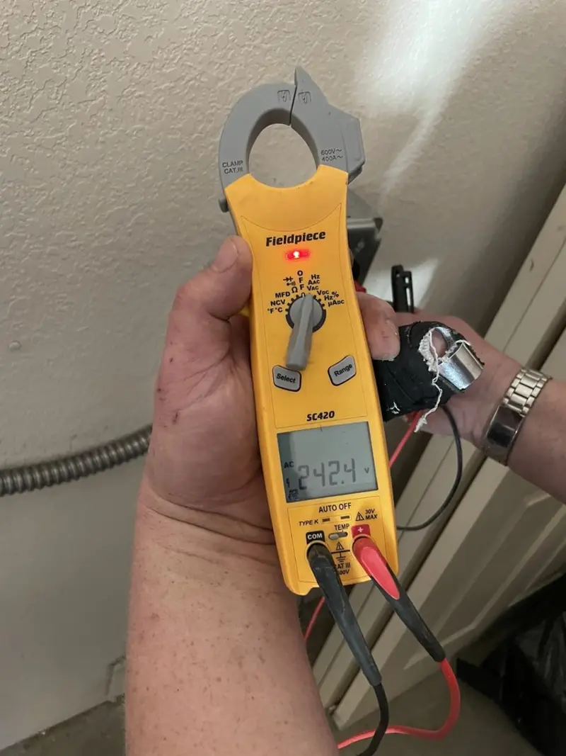 Voltage testing with clamp meter during Generator Installation in Prairie View